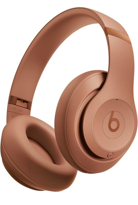 Beats Studio Pro headphones in Dune color, featuring Bluetooth noise cancelling, personalized spatial audio, and USB-C compatibility.